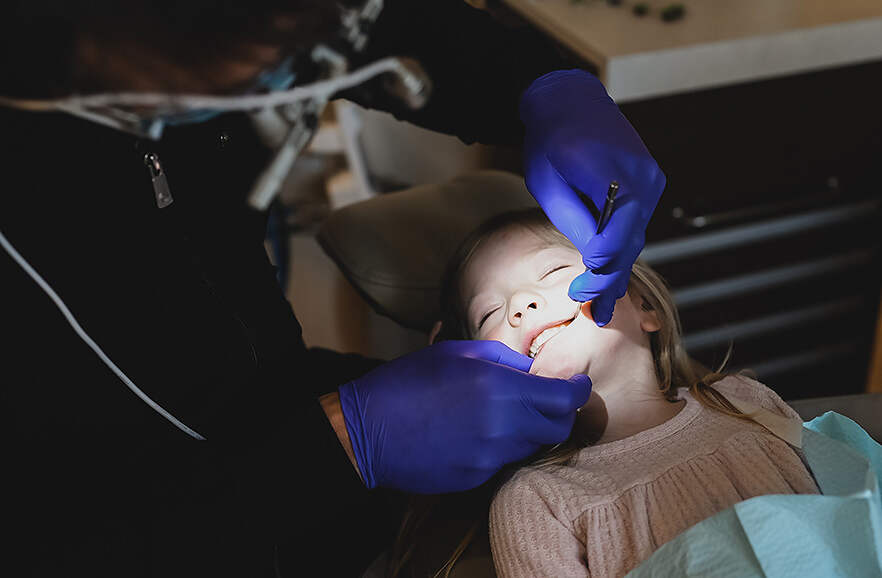Young girl getting a dental checkup